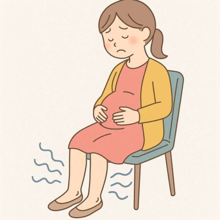 妊娠後期に足がむくんでつらい妊婦さんのイラスト
